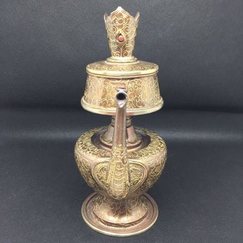 Carved pewter bumpa